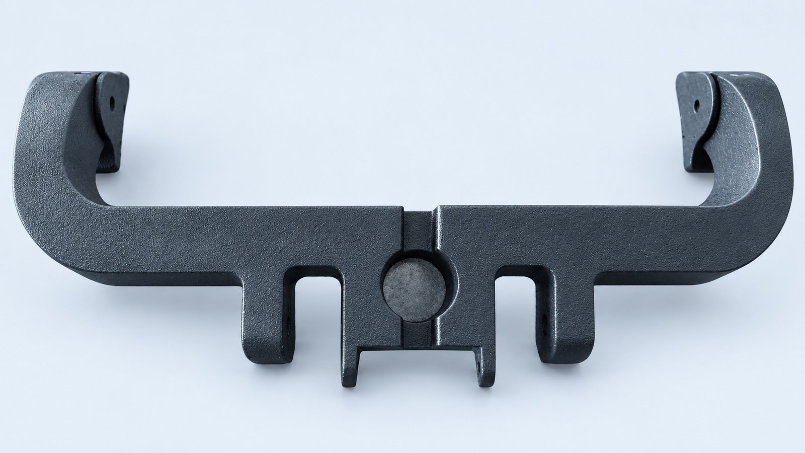Studio-retouched company die casting component photograph