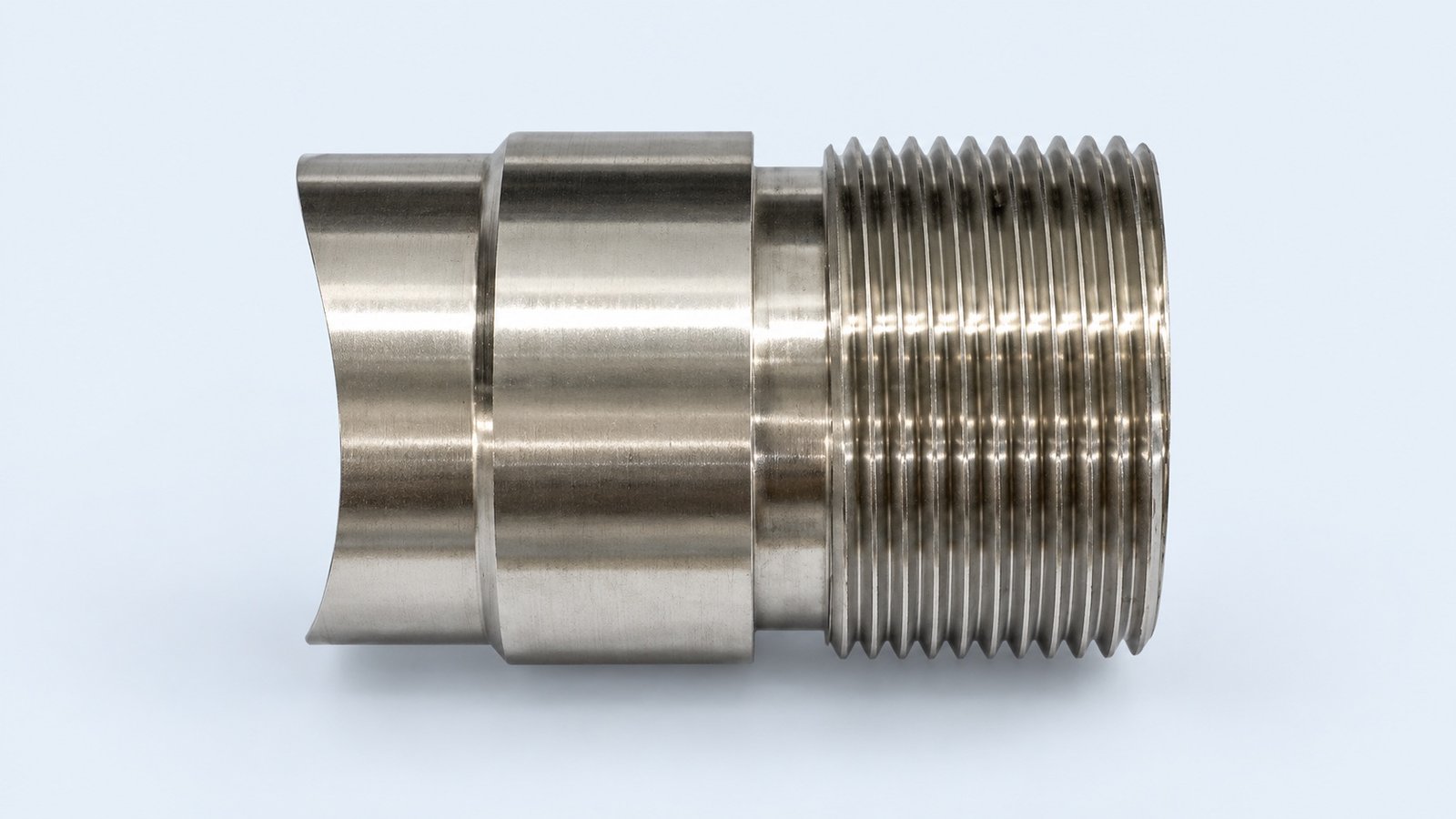 Studio-retouched company photograph of a stepped externally threaded fitting