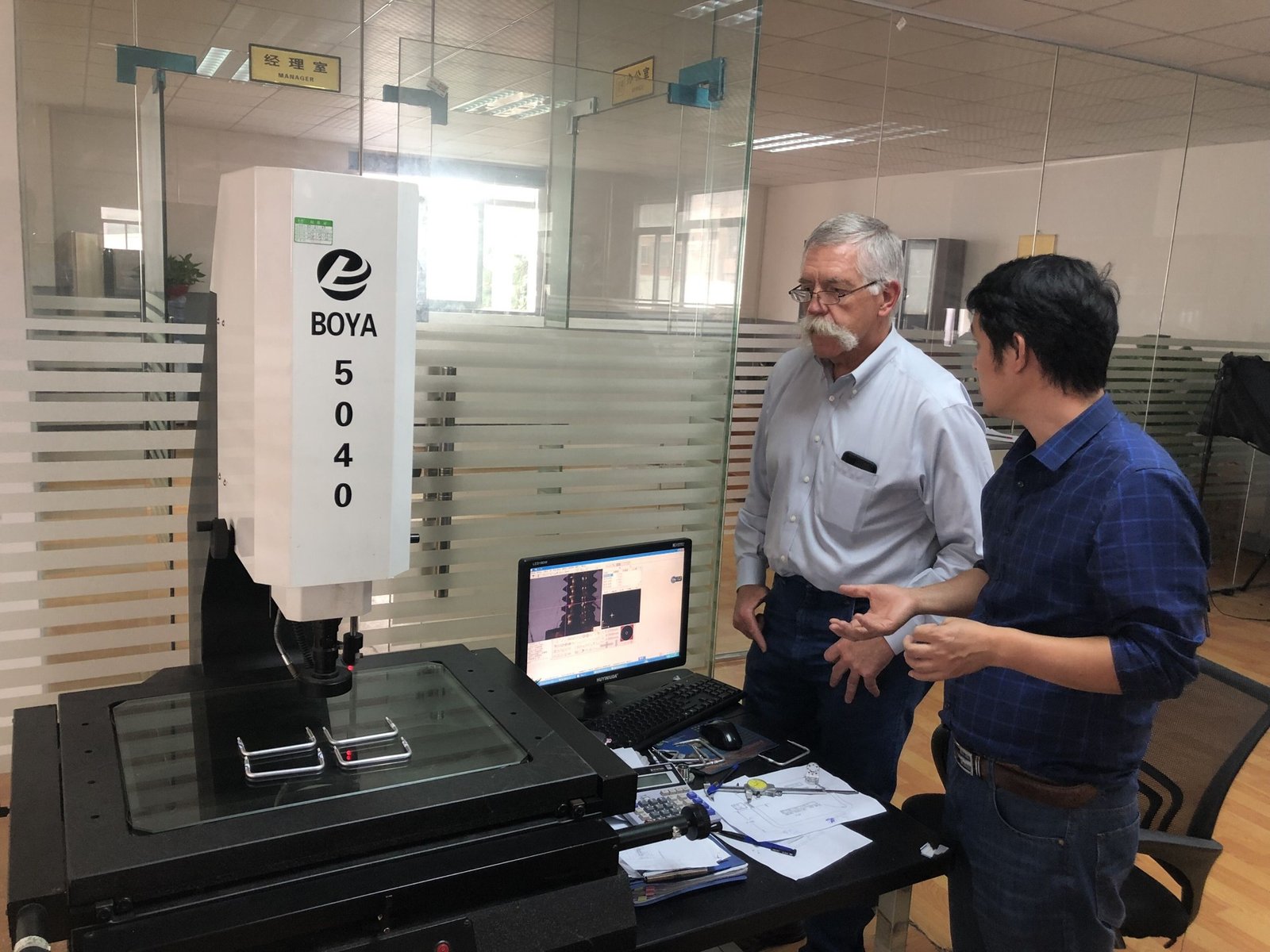 Manufacturing project discussion — genuine photograph