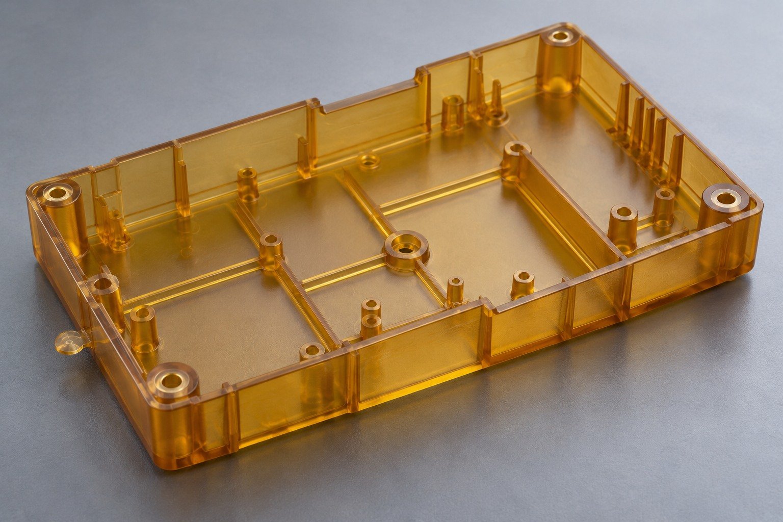 PEI amber molded electronics tray — illustrative generated concept