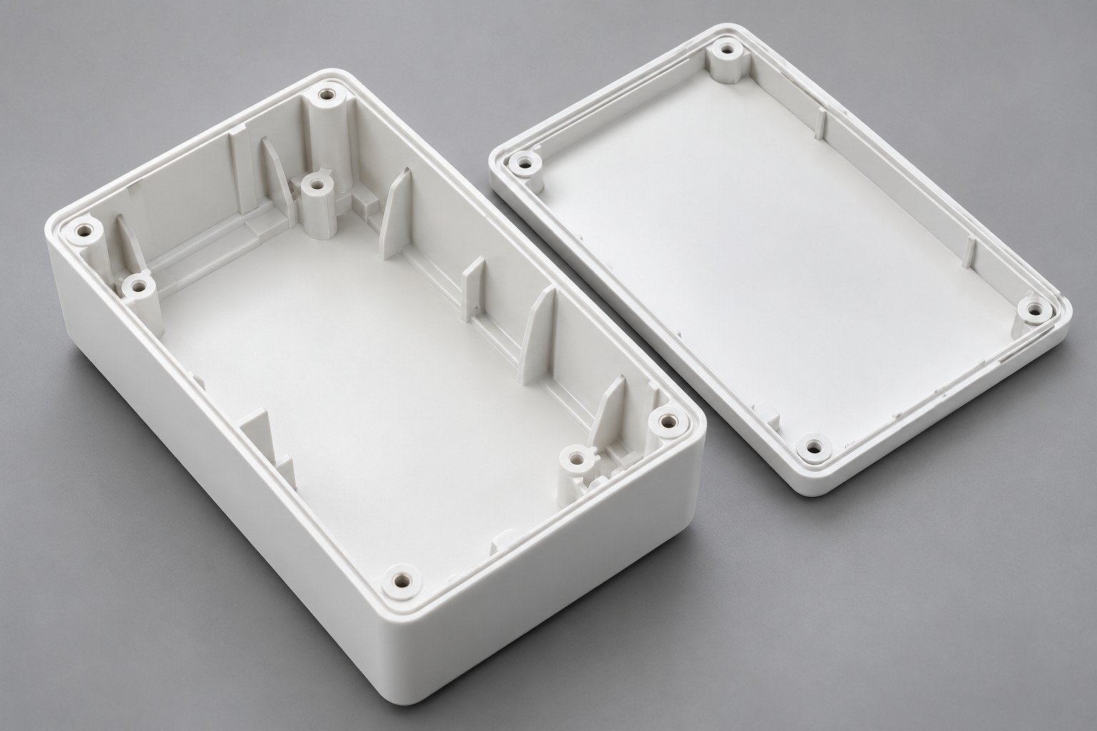 Open polymer enclosure with sidewalls, ribs, bosses and separate cover; illustrative component concept,not measured/company/customer part